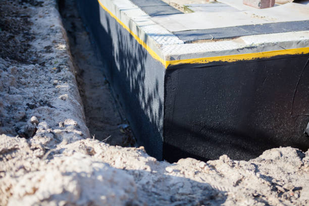 Professional Waterproofing technician working in Higginsport, OH